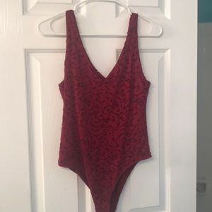 Burgundy lace body suit